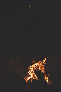 camp fire during full moon thumbnail