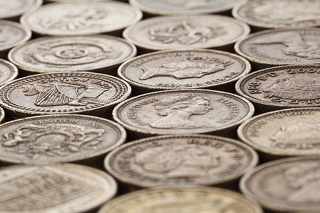 shallow focus photography of coins thumbnail