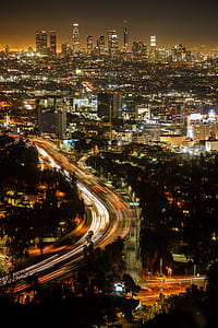 time-lapse photography of high rise buildings thumbnail
