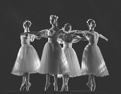 grayscale photo of four ballerinas dancing thumbnail