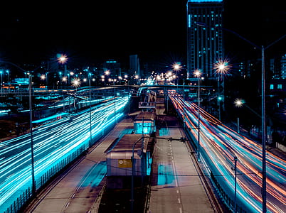 timelapse photo of roadway during nighttime thumbnail