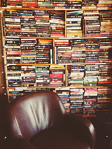 pile of VHS case lot on wood rack thumbnail
