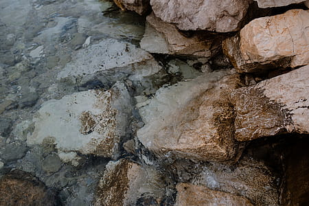 Rocks by waterside thumbnail