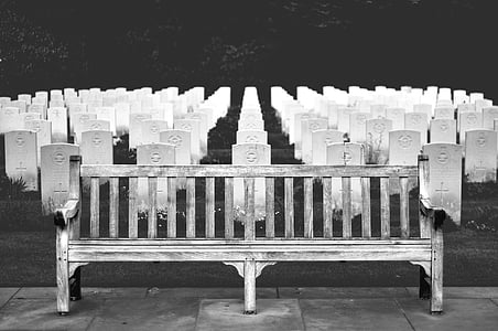 grayscale photography of bench near cemetery thumbnail