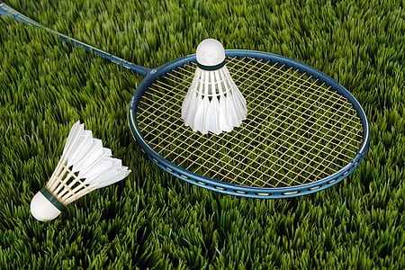 blue badminton racket and white shuttle cocks thumbnail