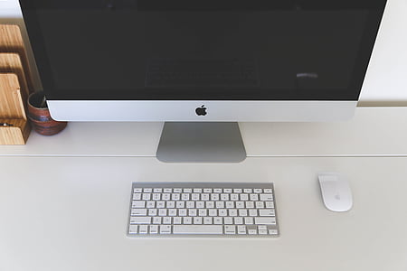 iMac Aluminum. silver Apple Magic Keyboard, and Magic Mouse on white surface thumbnail