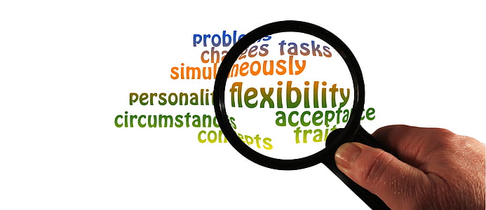 person holding magnifying glass thumbnail