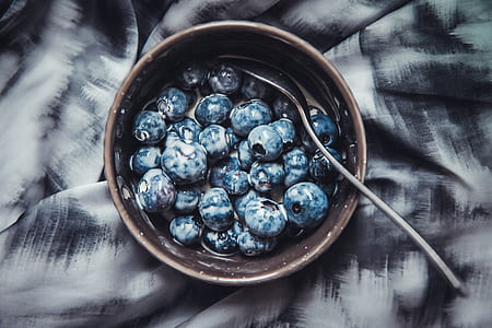 top view of blueberries served on round ceramic bowl thumbnail