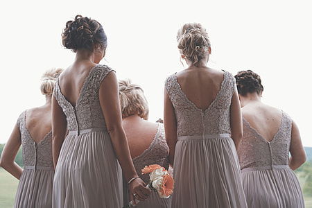 several bride's maids facing backward thumbnail