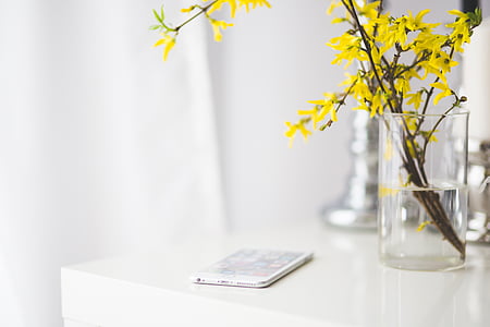 white smartphone on white table thumbnail