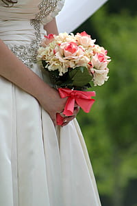woman holding flower bouquet thumbnail