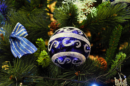 blue and white Christmas bauble hanged on green Christmas tree close-up photography thumbnail