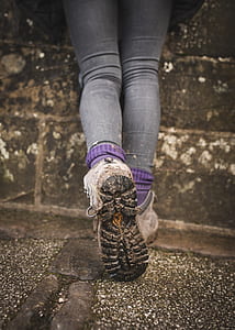 woman wearing gray denim jeans and gray shoes thumbnail