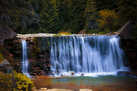 timelapse photography of water falls thumbnail