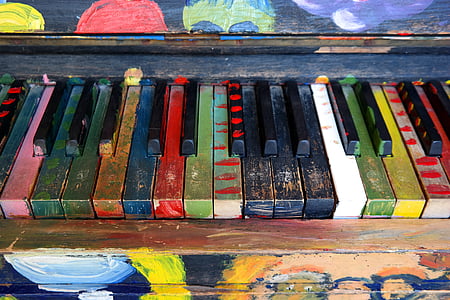 photo of painted black and multicolored piano thumbnail