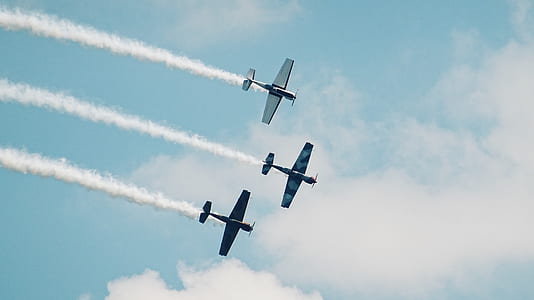 three airplanes flying thumbnail