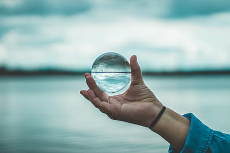 Person Holding Crystal Ball thumbnail