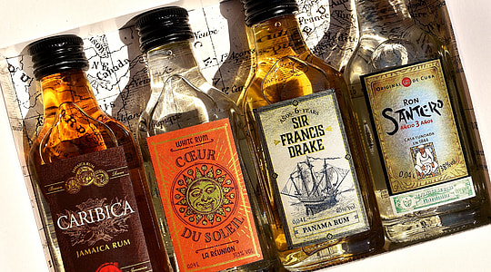 four assorted glass bottles thumbnail