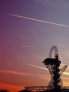 Silhouette of Roller Coaster during Sunset thumbnail