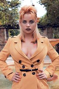 woman wearing beige double-breasted coat thumbnail