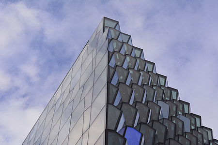 black concrete high-rise building under the white clouds during daytime thumbnail