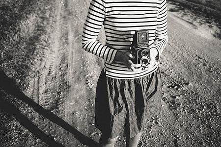 Girl with a medium format film camera thumbnail