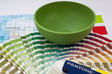 green plastic bowl on multicolored card lot thumbnail