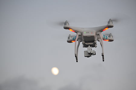 flying white quad-copter drone thumbnail