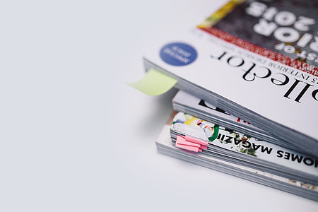 Stack of white magazines with copy space thumbnail