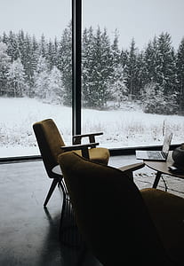 photo of brown padded chairs near laptop thumbnail