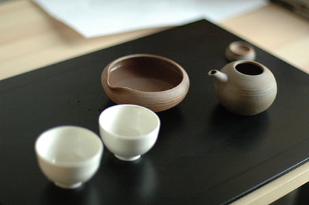 three bowls on black table thumbnail