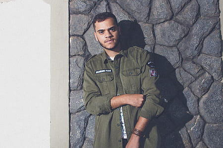 Man Wearing Green Button-up Jacket thumbnail