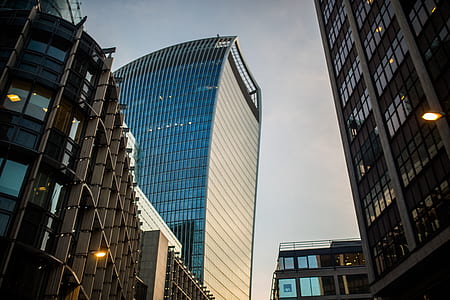 Bottom View Curtain Wall Building Under Blue Sky thumbnail
