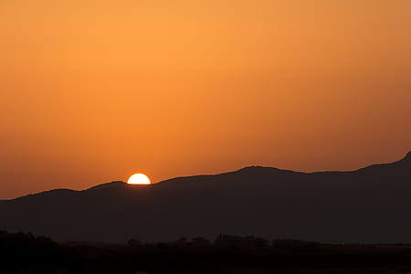 silhouette of mountain during sunset thumbnail