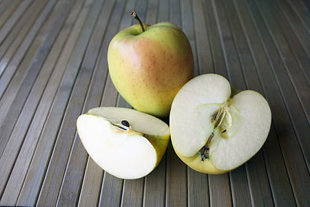 sliced green apple fruit on gray wooden surface thumbnail