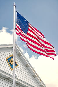 U.s.a. Flag Mounted on White Steel Pole thumbnail