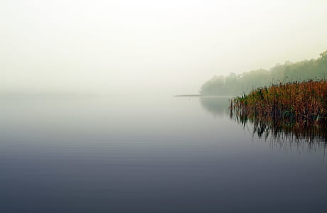 body of water near mountain thumbnail
