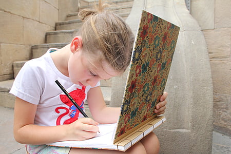 girl wearing white t-shirt writing thumbnail