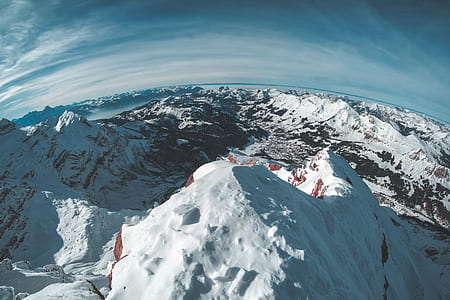 aerial photography of tip of snow-capped mountain thumbnail