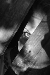 photo of person peeking on wooden floor thumbnail