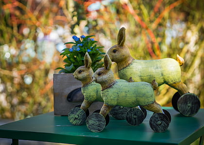 three rabbit figurines thumbnail