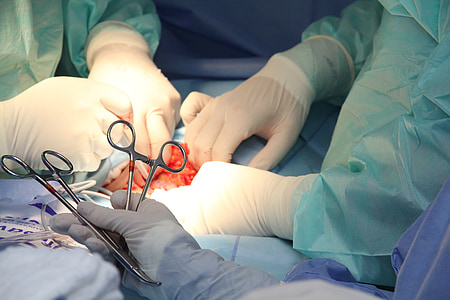 doctor's performing surgery thumbnail