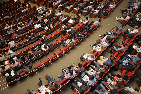 group of people sitted on chairs thumbnail