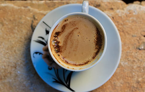 White Ceramic Mug With Coffee and White Ceramic Saucer thumbnail