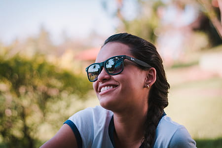 Woman Wearing Black Ray-ban Sunglasses thumbnail