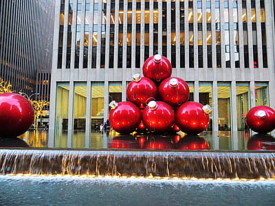 Red Baubles Near Grey High-rise Building thumbnail