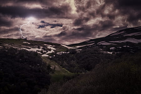 mountain under cloudy sky thumbnail