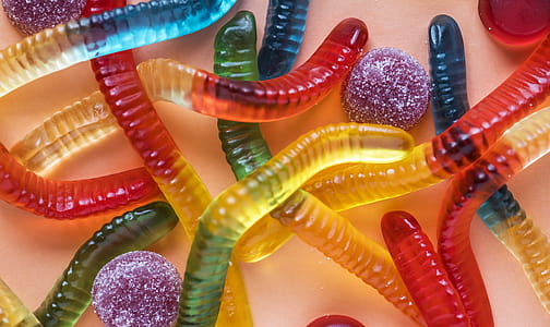 Closeup Photo of Assorted-color Gummy Worms thumbnail