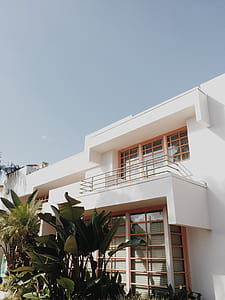 white and brown concrete house thumbnail
