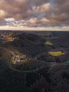 bird's eye view of village on mountains thumbnail